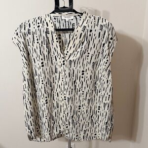 Elegant Black and White Patterned Blouse